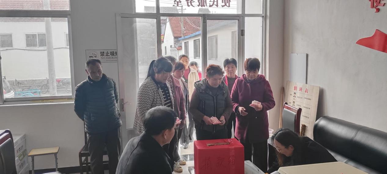 莱芜区寨里镇水东村暖流涌动：党旗领航聚大爱 全村齐心筑生命防线